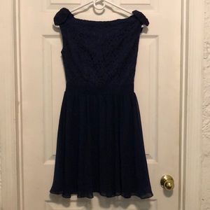 Bardot neckline navy dress, thigh to knee length